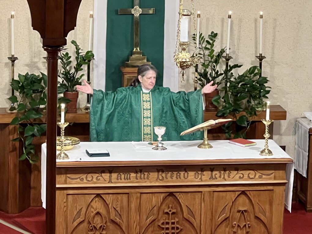 Rev Mary blessing the sacraments